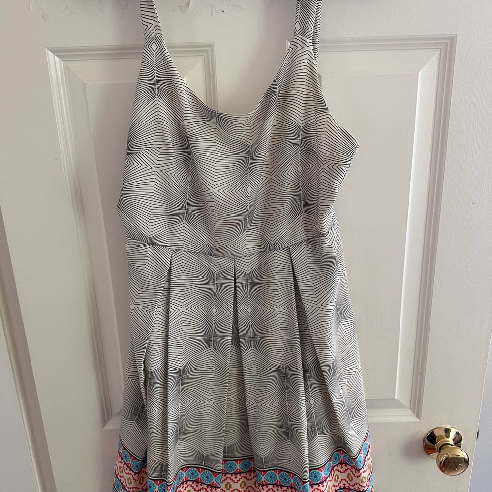 Unique Geometric Patterned Dress with Colorful Hem
